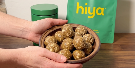 Picture of hand holding a oat truffles made with Hiya Vanilla Greens 