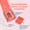 Kids daily vitamin tablets in coral box with refillable glass bottle and free sticker pack for healthy habits