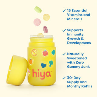 Kids vitamin tablets in yellow bottle with fruit icons, supporting immunity and growth, naturally sweetened
