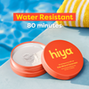 Hiya Kids Mineral Sunscreen SPF 40, water resistant 80 minutes, by pool with towel