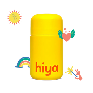 Yellow Hiya vitamin tablet bottle with smiling sun, rainbow, and heart wings
